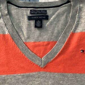 Orange and gray striped sweater